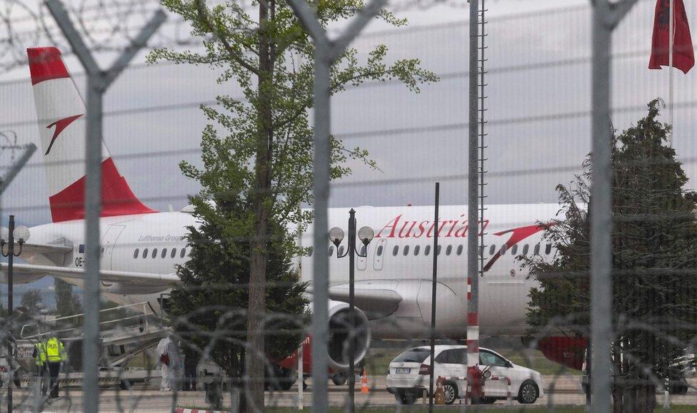 Albanian police handout shows Austrian Airlines plane on runway at Tirana airport