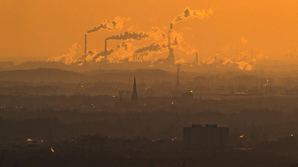 Steam and exhaust rise from different companies on a cold winter day on January 6, 2017 in Oberhausen, Germany.