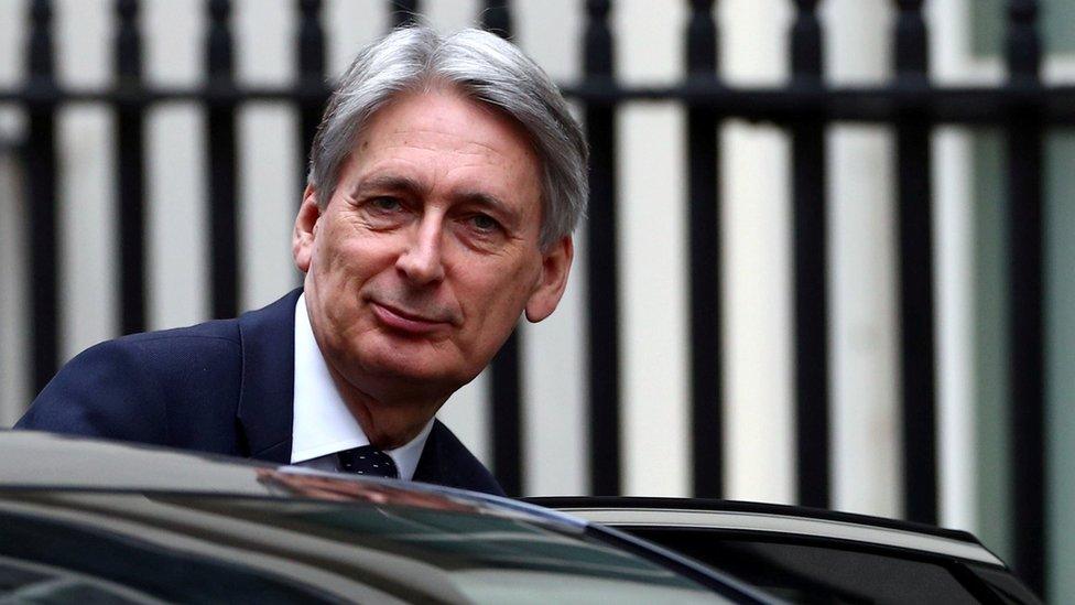 Philip Hammond getting into a car