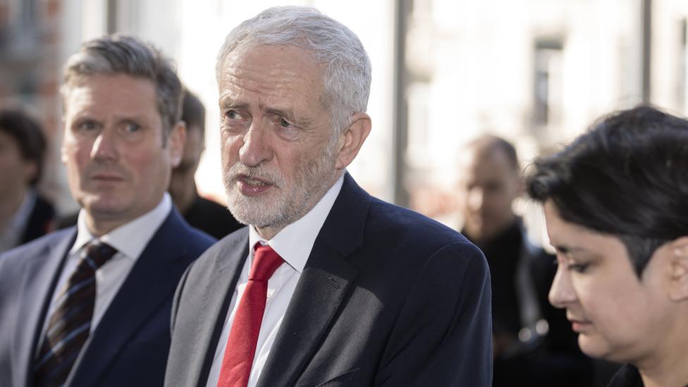 Jeremy Corbyn (C) in Brussels, 21 Feb 19