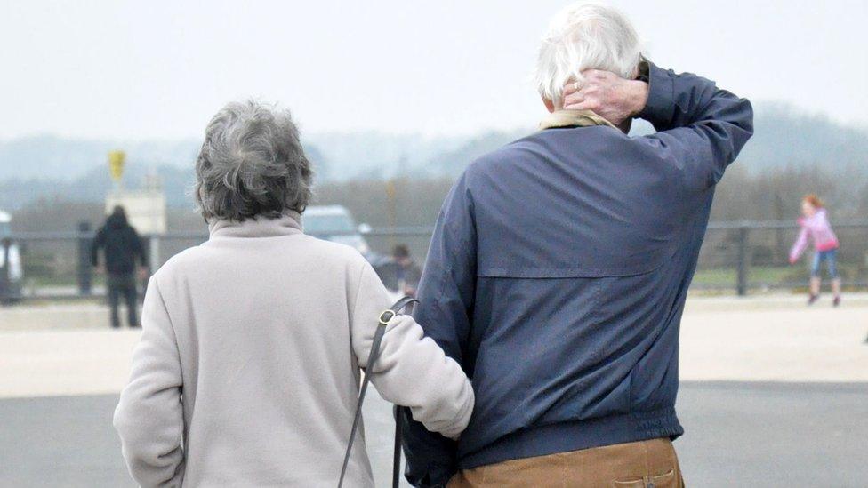 A man and a woman on a stroll in Sussex