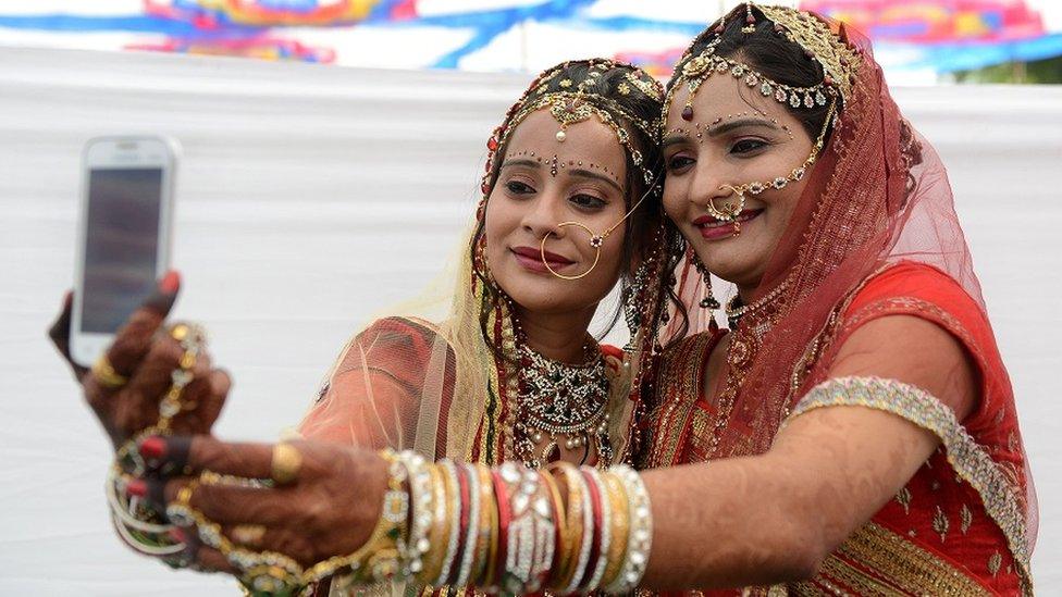 Indian brides taking a selfie