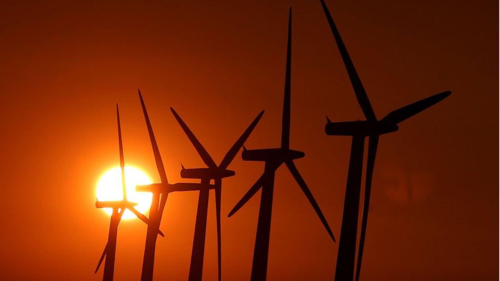 File photo dated 26/08/13 of wind turbines in Oxfordshire,