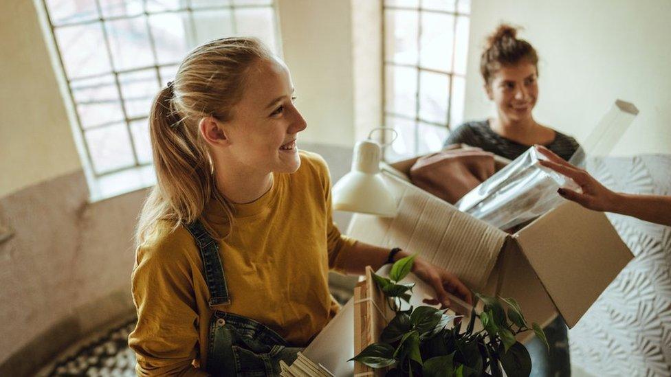 Women moving into student accommodation