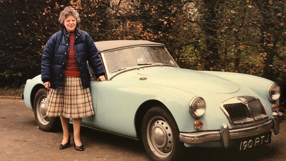 The MG pictured with a precious owner