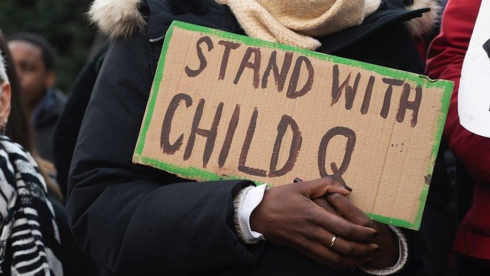 Protest sign reading 'stand with Child Q'