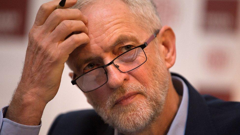 Jeremy Corbyn scratches his head