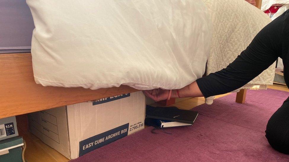 Documents under bed in Southampton