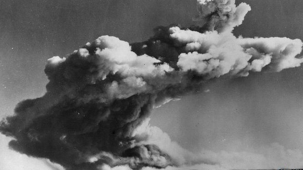 A drifting mushroom cloud hangs over the Monte Bello Islands off Western Australia, after Britain's first atomic bomb is tested