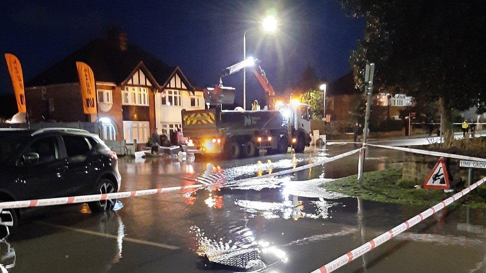 Damaged water pipe floods streets and houses