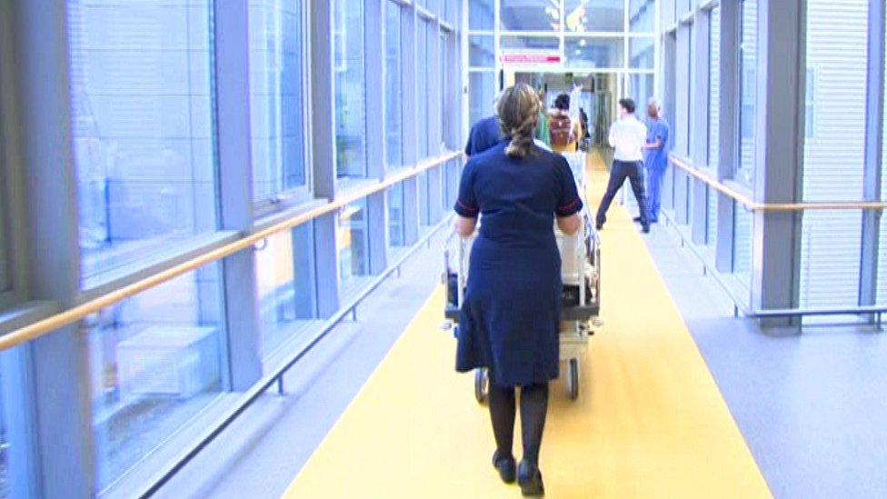 Patient being transferred on a trolley