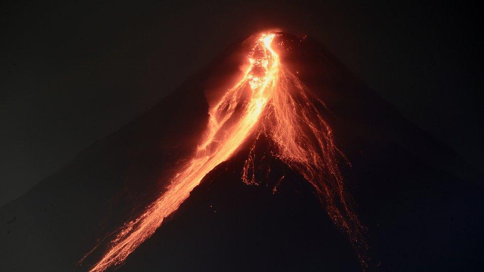 Lava flows from the crater of Mayon Volcano in the Philippines