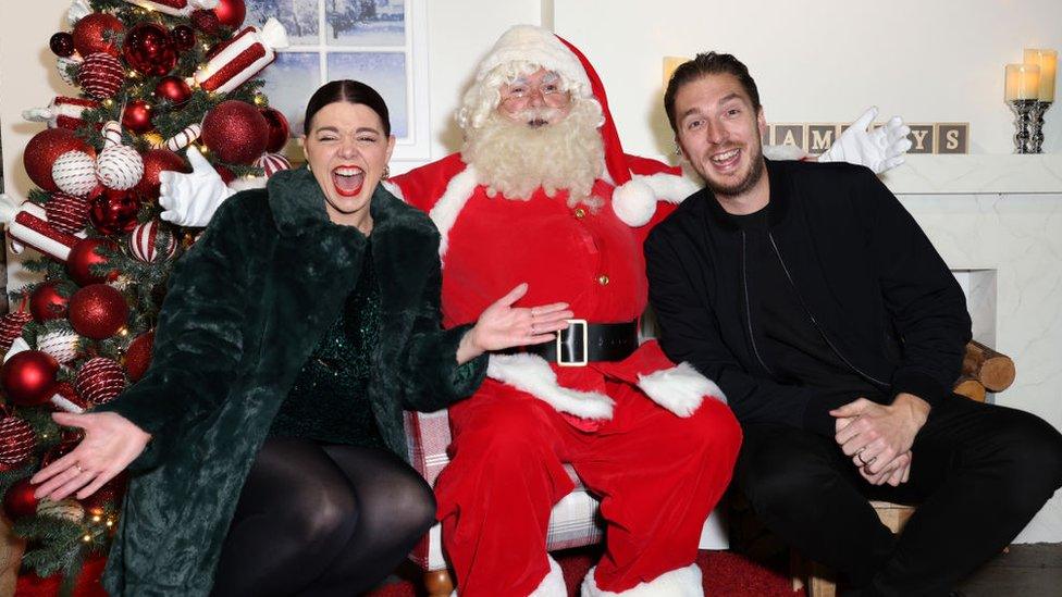 Lad Baby and Roxanne, with Santa