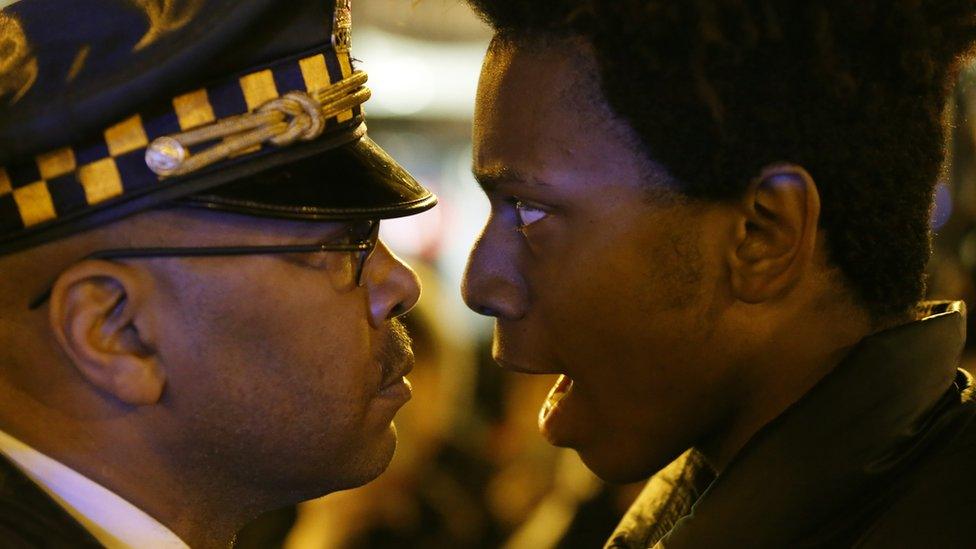 Police and protester