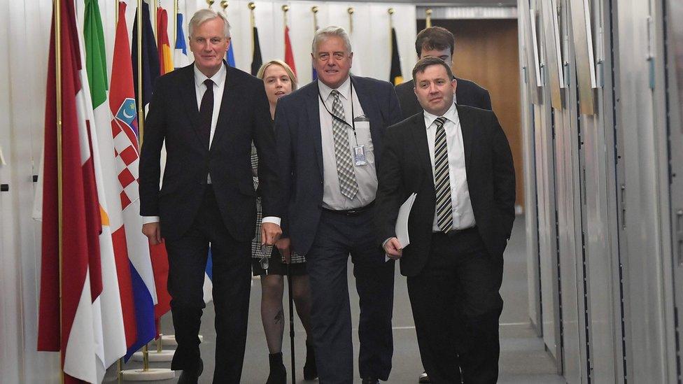 Northern Ireland Ulster Unionist Party (UUP) leader Robin Swann (R) and UUP European Parliament member Jim Nicholson (C) meets with EU Chief Brexit negotiator Michel Barnier at the European Commission in Brussels on October 9, 2018. (