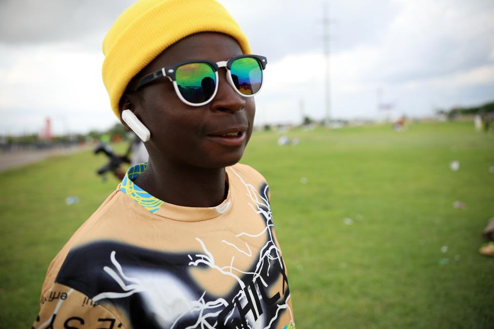 A man with a yellow head warmer