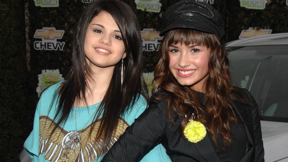 Lovato (right) with her former Disney co-star Selena Gomez in 2008