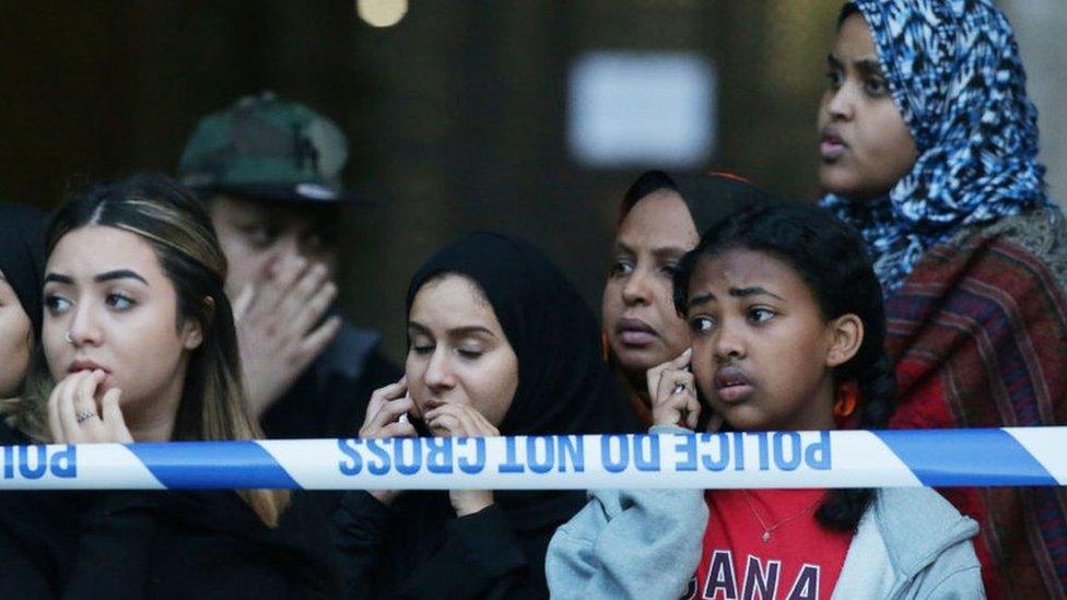 local residents watch as Grenfell Tower is engulfed by fire