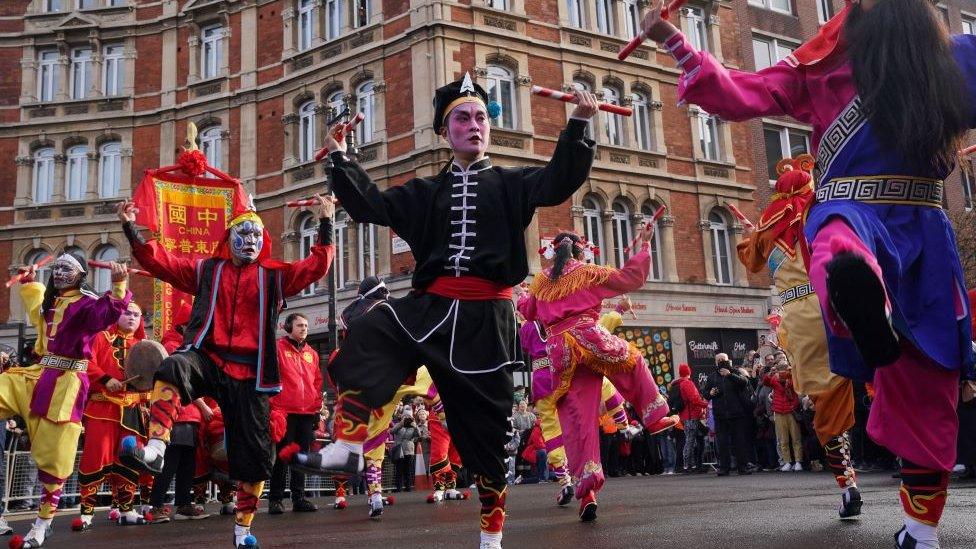 Performers take part in a parade involving costumes, lion dances and floats, to mark Lunar New Year, also known as the Spring Festival or Chinese New Year, in London