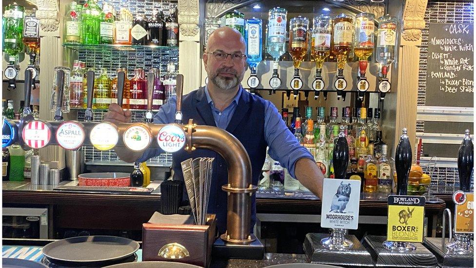 Josh Lee behind the bar at the Thomas Egerton