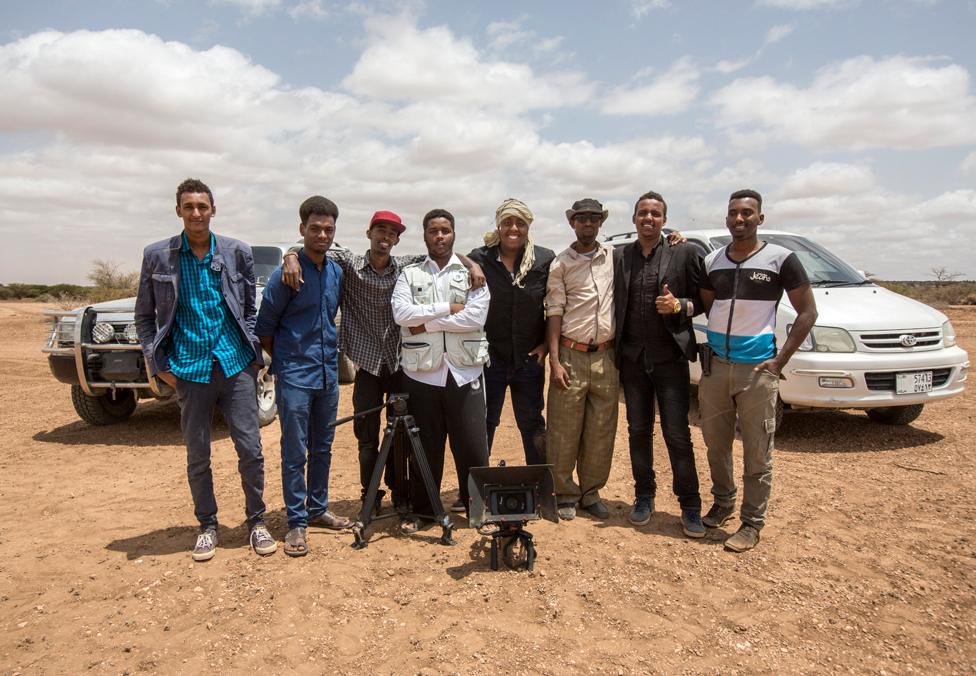 Group picture in the desert - Omar Hassan, Mohamed Saleh, Adam Konvict, Ibrahim Mohamed, Hersi Abdirizak, Saeed Abdi, Abdiaziz Mohamed and Mohammed Shire