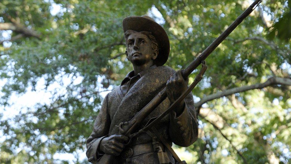 A Confederate statue, coined Silent Sam, before it was pulled down