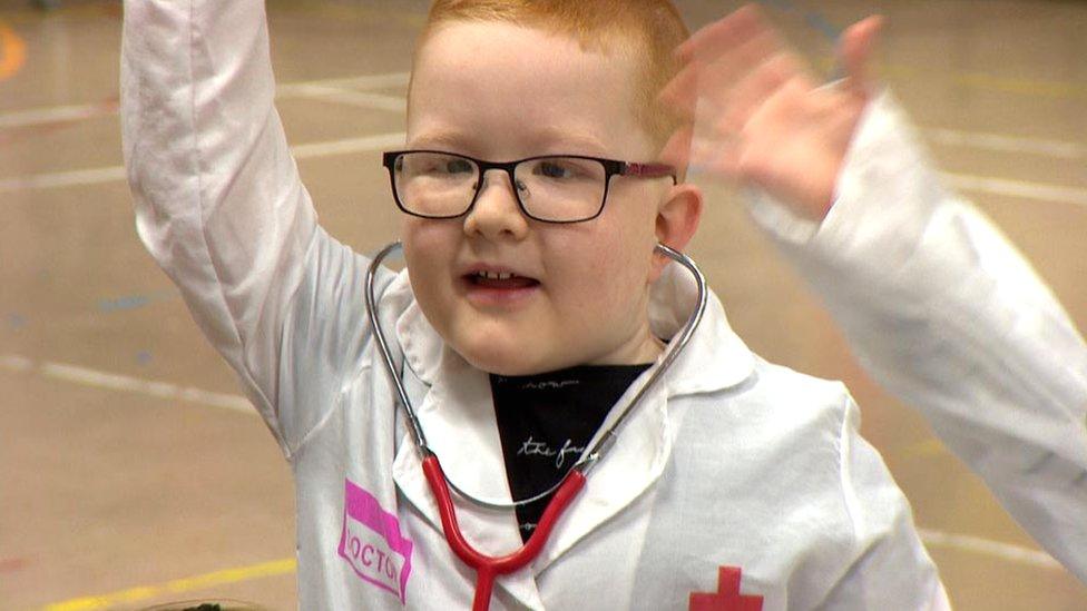 Boy dressed as nurse