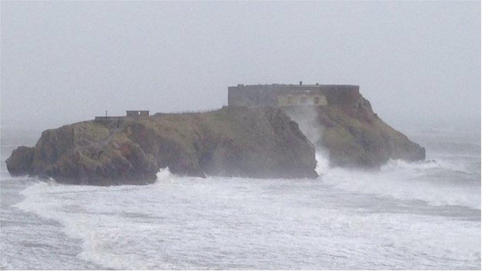 waves hit Tenby coast