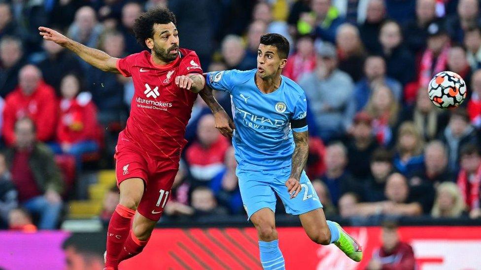 Mo Salah and Joao Cancelo.