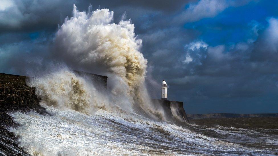 A huge wave smashing into sea defences in Porthcawl