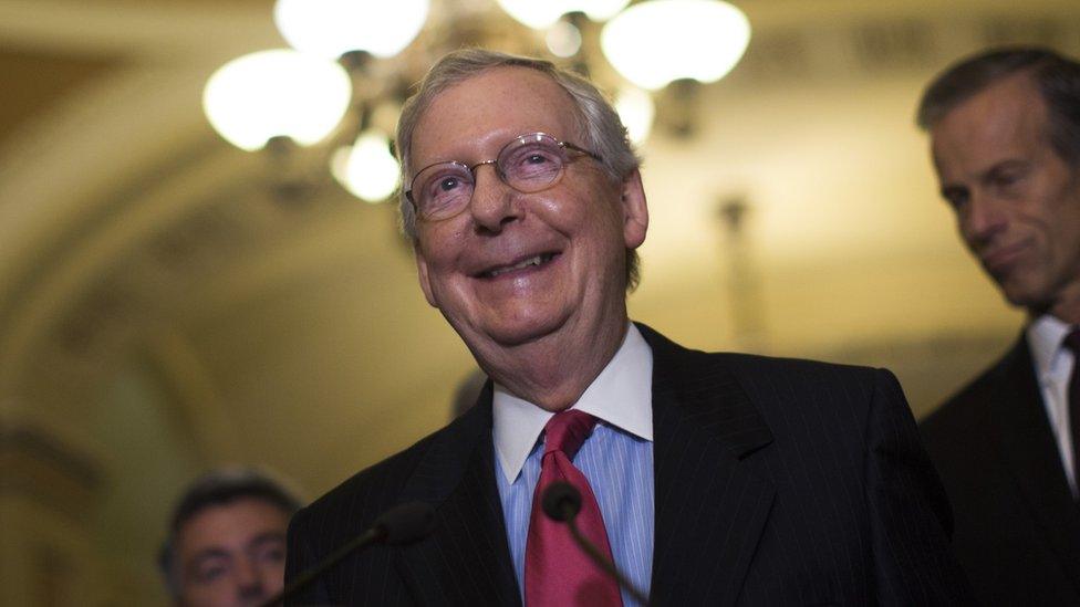 Mitch McConnell smiles at a Capitol Hill event.