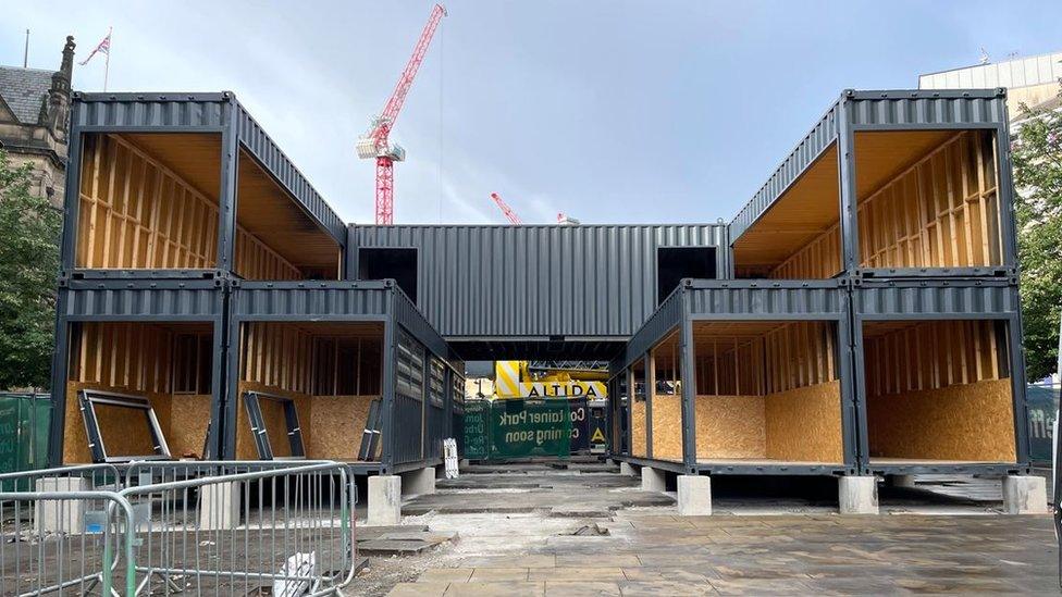 Image of empty stacked shipping containers