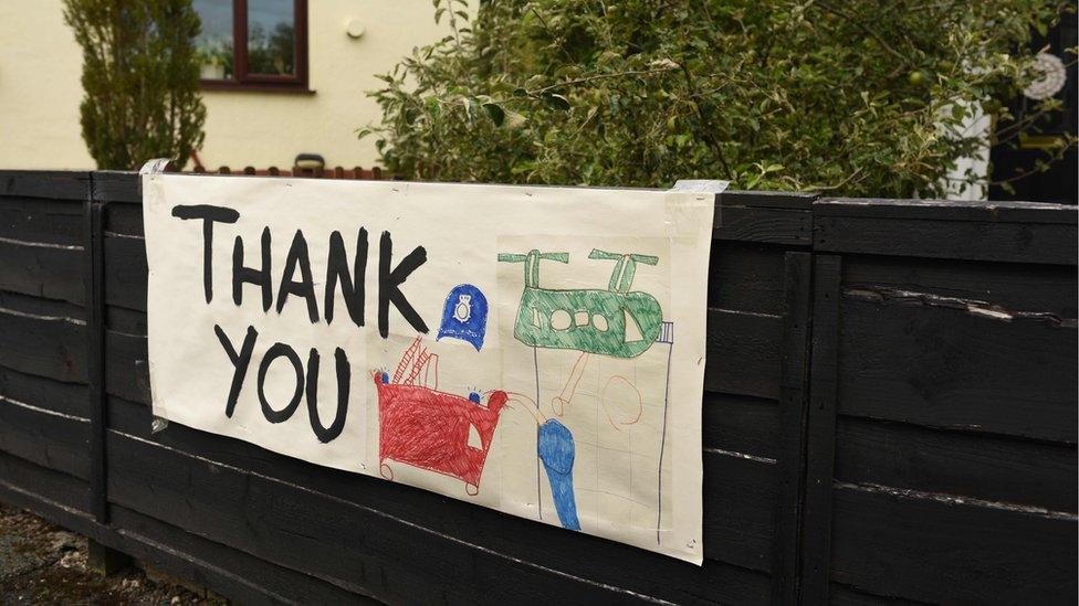 Thank you sign on a fence