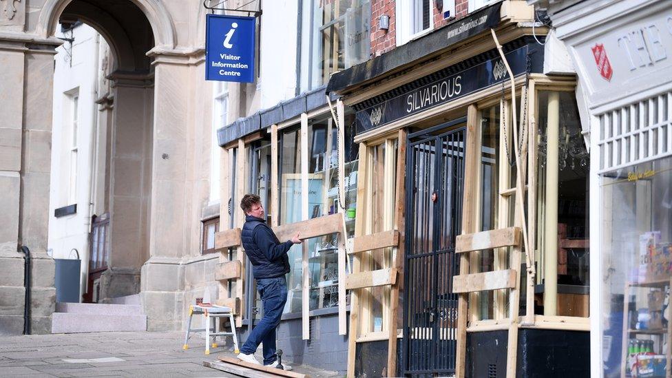 Boarding up shops ahead of Shrove Tuesday Football in Ashbourne