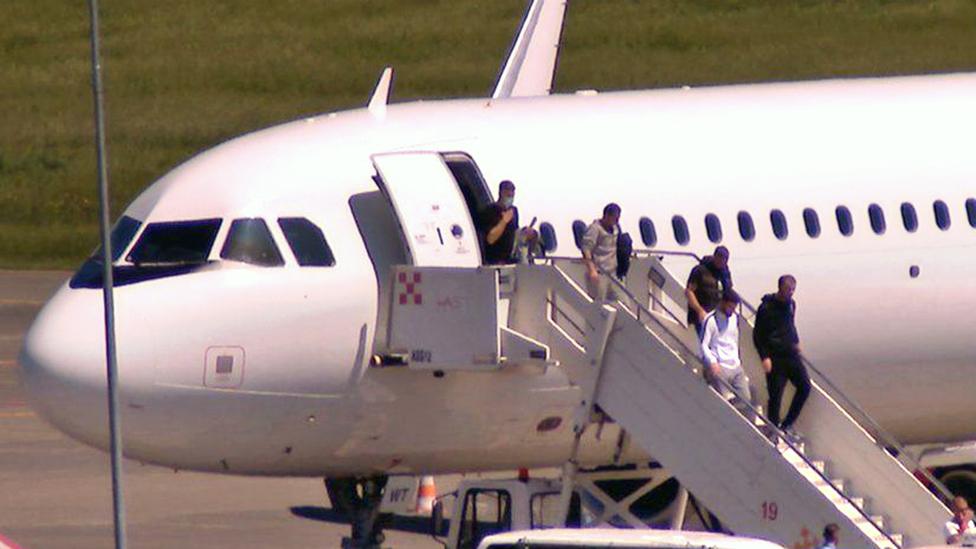 A UK deportation flight lands at Albania's Tirana airport