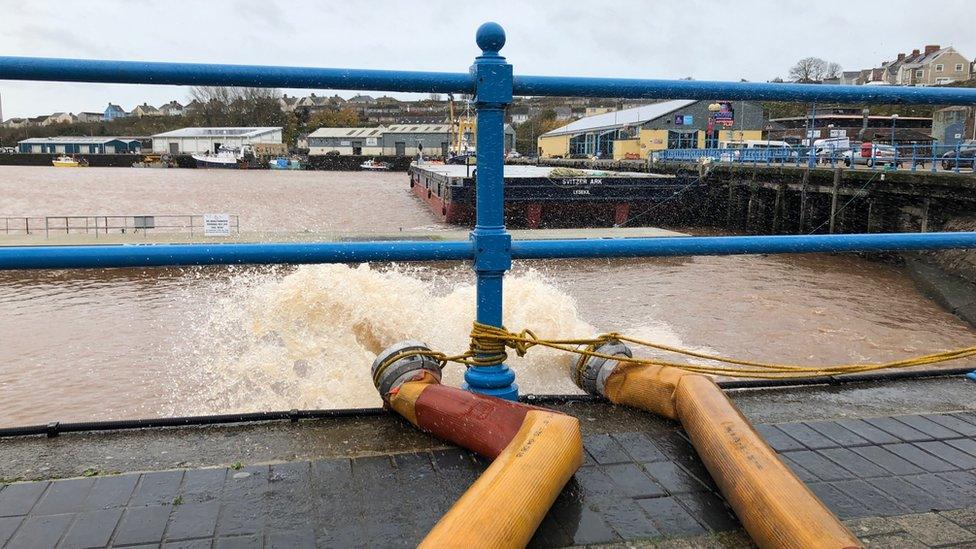 Pumps flushing water out into MIlford Haven Marina