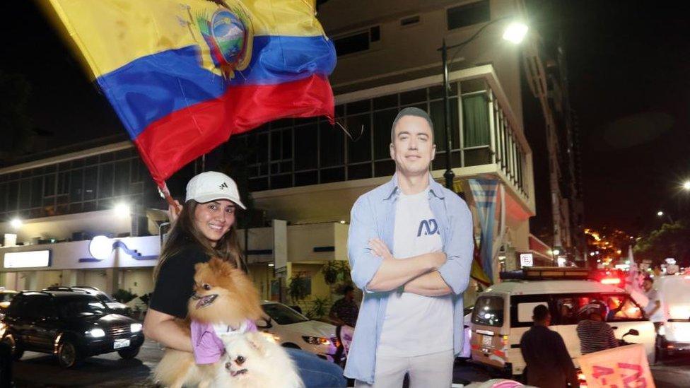 A supporter of the presidential candidate Daniel Noboa celebrate the victory of their candidate during the 2023 presidential elections in Guayaquil, Ecuador, 15 October 2023.