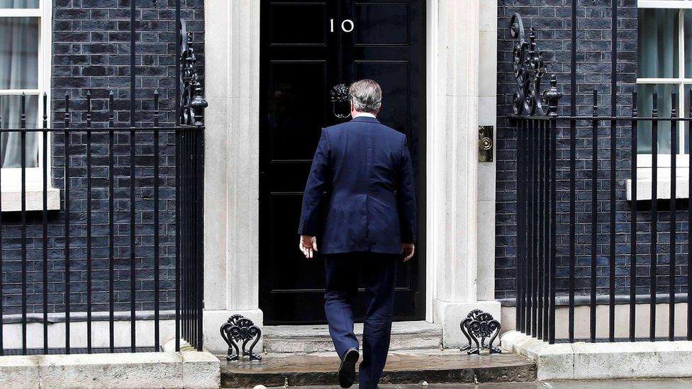 David Cameron returns to 10 Downing Street after making a statement on 11 July 2016