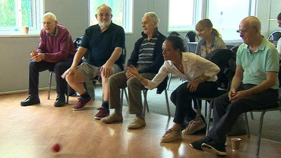 People playing boccia