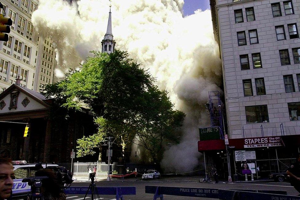 A wall of dust and debris