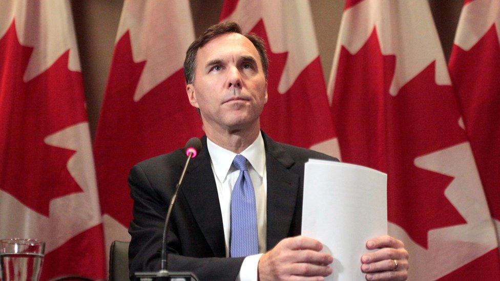 Canada"s Finance Minister Bill Morneau makes an announcement about the country"s housing market at government offices in Toronto,