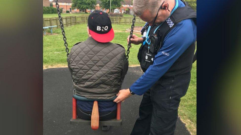 PCSO with man stuck in swing