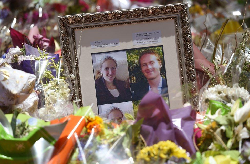 Photos showing barrister Katrina Dawson (L) and cafe manager Tori Johnson (R) sit amongst the floral tributes left outside the Lindt cafe in Sydney's Martin Place