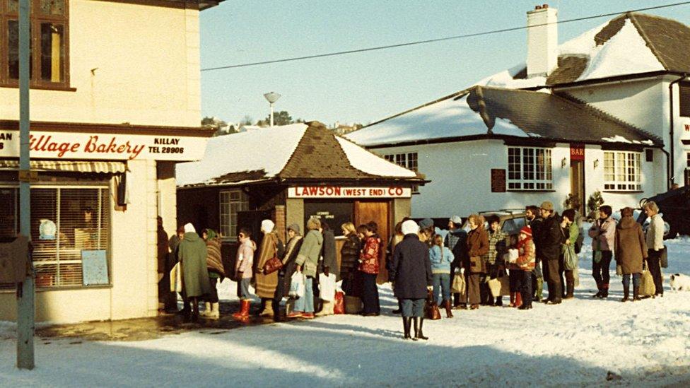 People queue outside a Swansea bakery in the snow in 1981