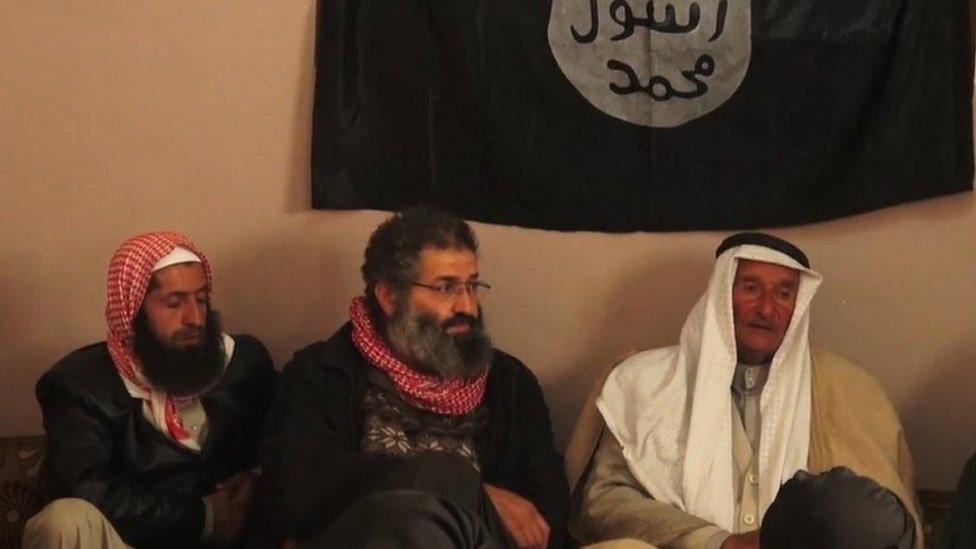 Mohammed Haydar Zammar (centre) attends a meeting between IS militants and Syrian tribal leaders in 2014