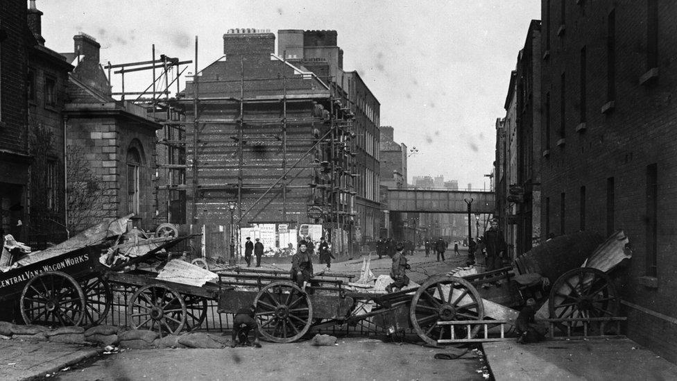 Irish Volunteers barricade Townsend Street, Dublin, to slow down the advance of troops, during the Easter Rising