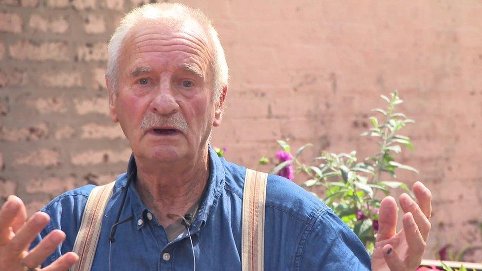 Man sitting in garden