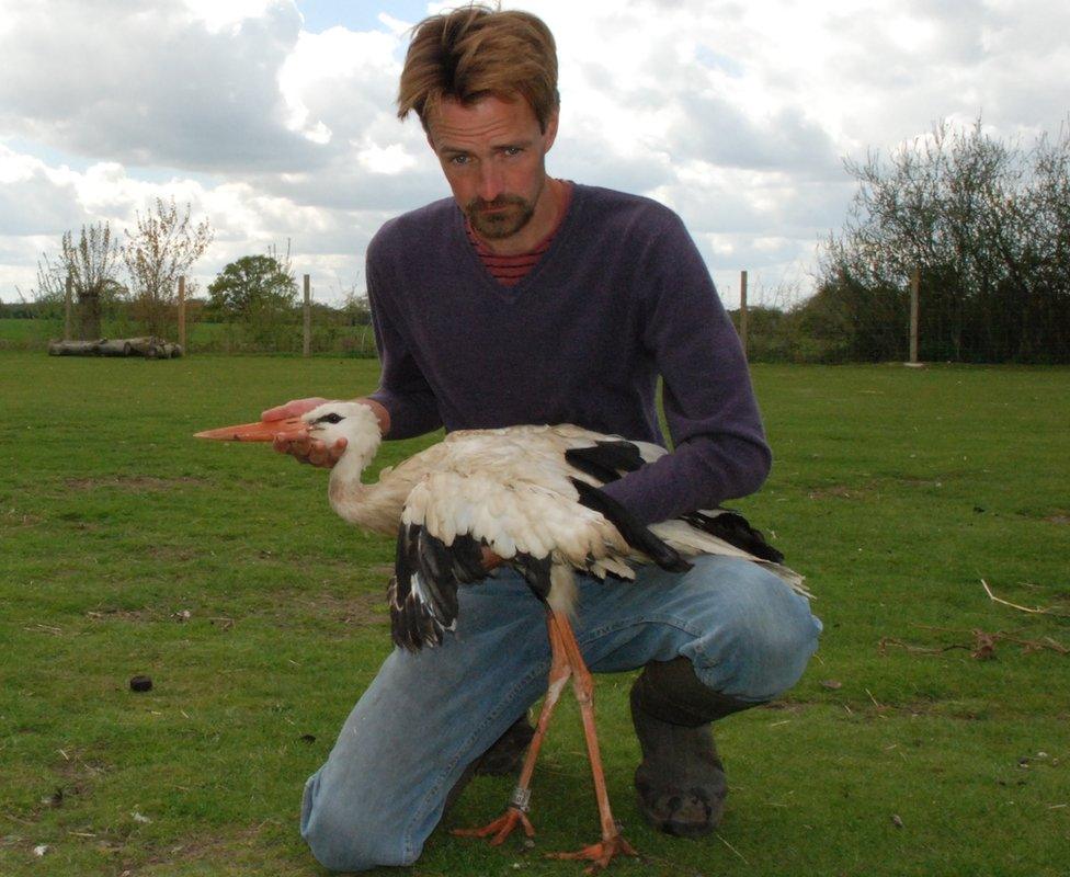 Ben Potterton with a white stork