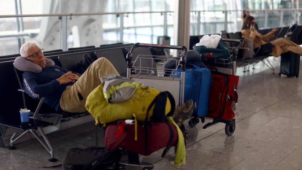 Sleepy passenger at Heathrow