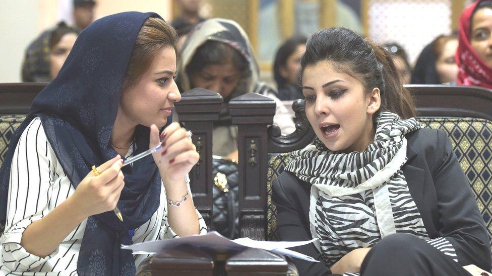 Tahmina Arian (L), 26, talks with Tahmina Rashiq at the first public event for the 'Where Is My Name' campaign in Kabul, Aug 2017